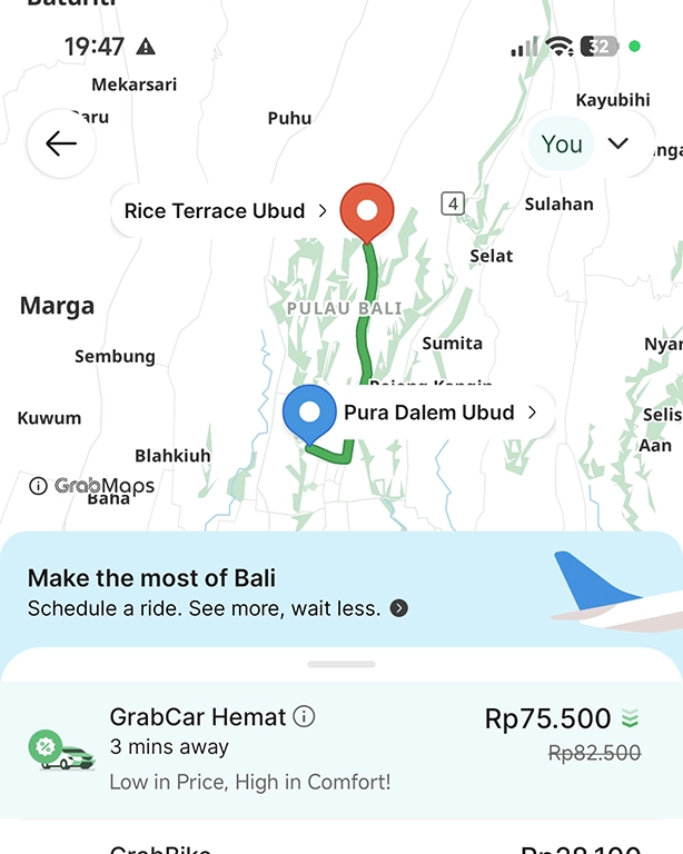 Captura de precio de un trayecto largo en coche con la app Grab.